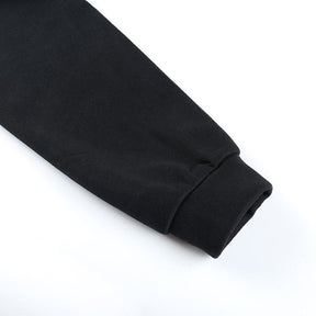 Black dress sleeve cuff close-up