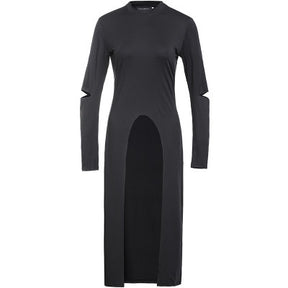 Plain black long-sleeve layering dress displayed alone against a pale background, with a high curved front opening, long back hem and small elbow cutouts.