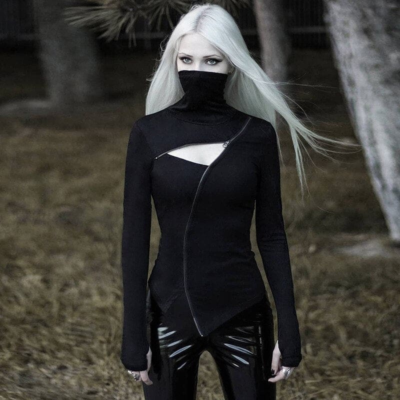 Outdoor portrait of the black fitted zip turtleneck, showing the tall raised collar and narrow opening above the bust.