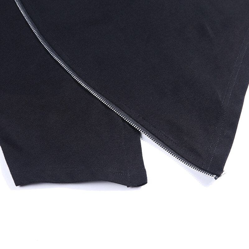 Detail of the silver-tone zipper running between the pointed black front panels at the hem.