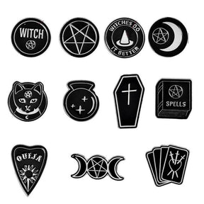 Grid of eleven black witchy pin designs on white, showing the different moon, pentagram, cat, coffin, crystal-ball, tarot and slogan shapes.