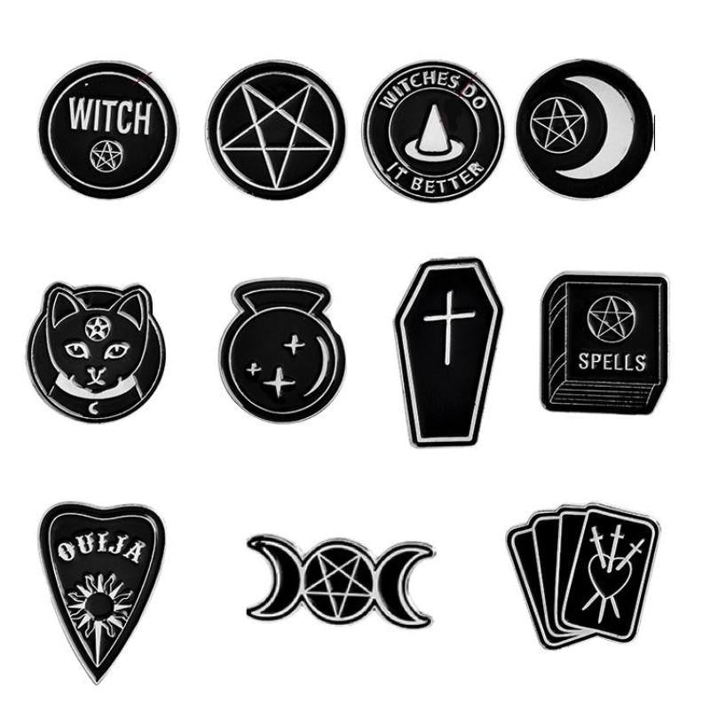 Grid of eleven black witchy pin designs on white, showing the different moon, pentagram, cat, coffin, crystal-ball, tarot and slogan shapes.