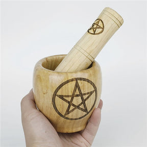 Wooden mortar set in-hand side view