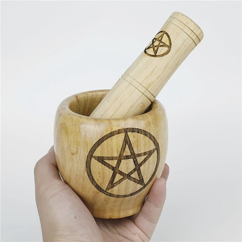 Wooden mortar set in-hand side view