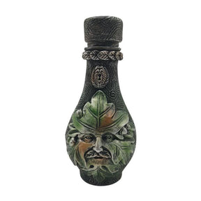 Green leaf decorative bottle isolated