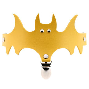 Bright yellow bat garter showing the wing silhouette, narrow leg band and stocking attachment.
